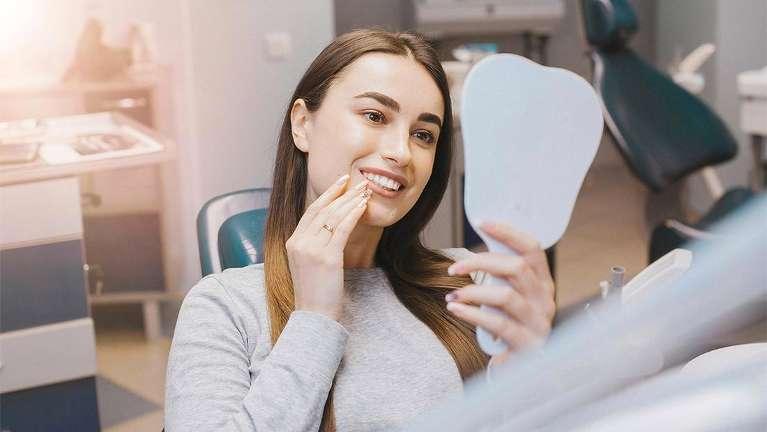woman sitting in a dental chair