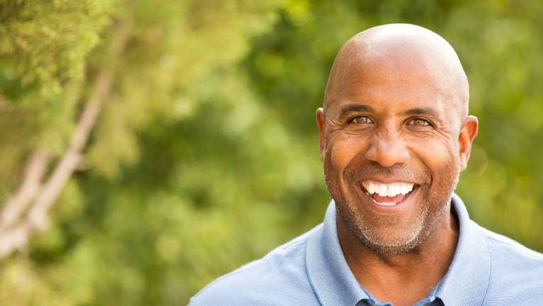 A man with dental implants in Vienna, VA